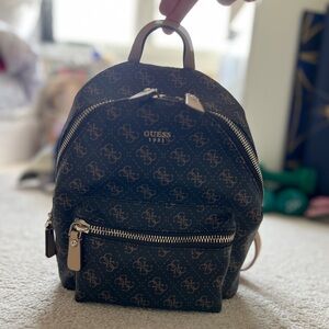Guess Black and Brown Patterned Mini Backpack